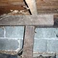 A collapsing crawl space support in a Pittsford home.