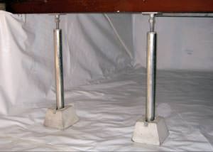 A  Cortland crawl space support system repairing a sagging structure.