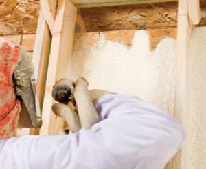 Spray foam insulation being installed by a certified professional in New York