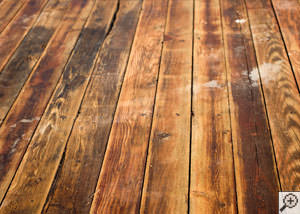 A Geneva wood floor displaying water damage.