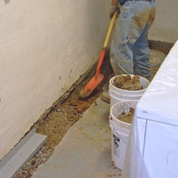 Digging a trench for a French Drain system in Rochester