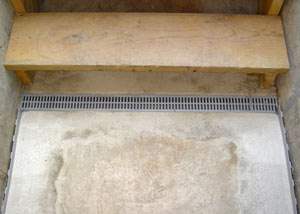 Our grated drain system installed on a leaking basement staircase in .