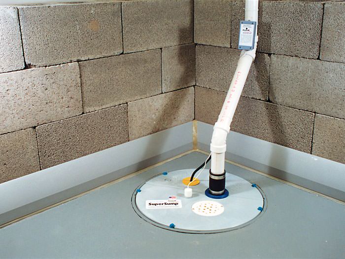 Baseboard Basement Drain Pipe System In, How To Install Basement Floor Drain