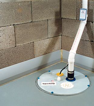 A baseboard basement drain pipe system installed in Geneva
