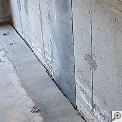 an ugly basement weeping tile drainage system that's clogged and not working in Webster.