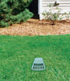A buried gutter drain downspout extension installed in a  home
