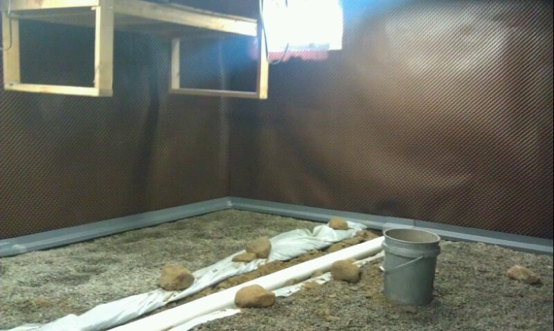 We installed drainage matting along the walls that will direct any water down to the WaterGuard system and into their new sump pump.