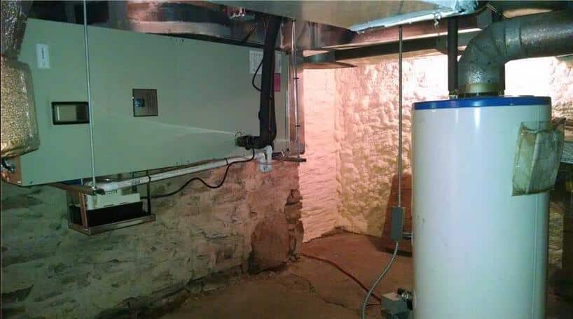Geothermal heat pump system with view of spray foam insulation