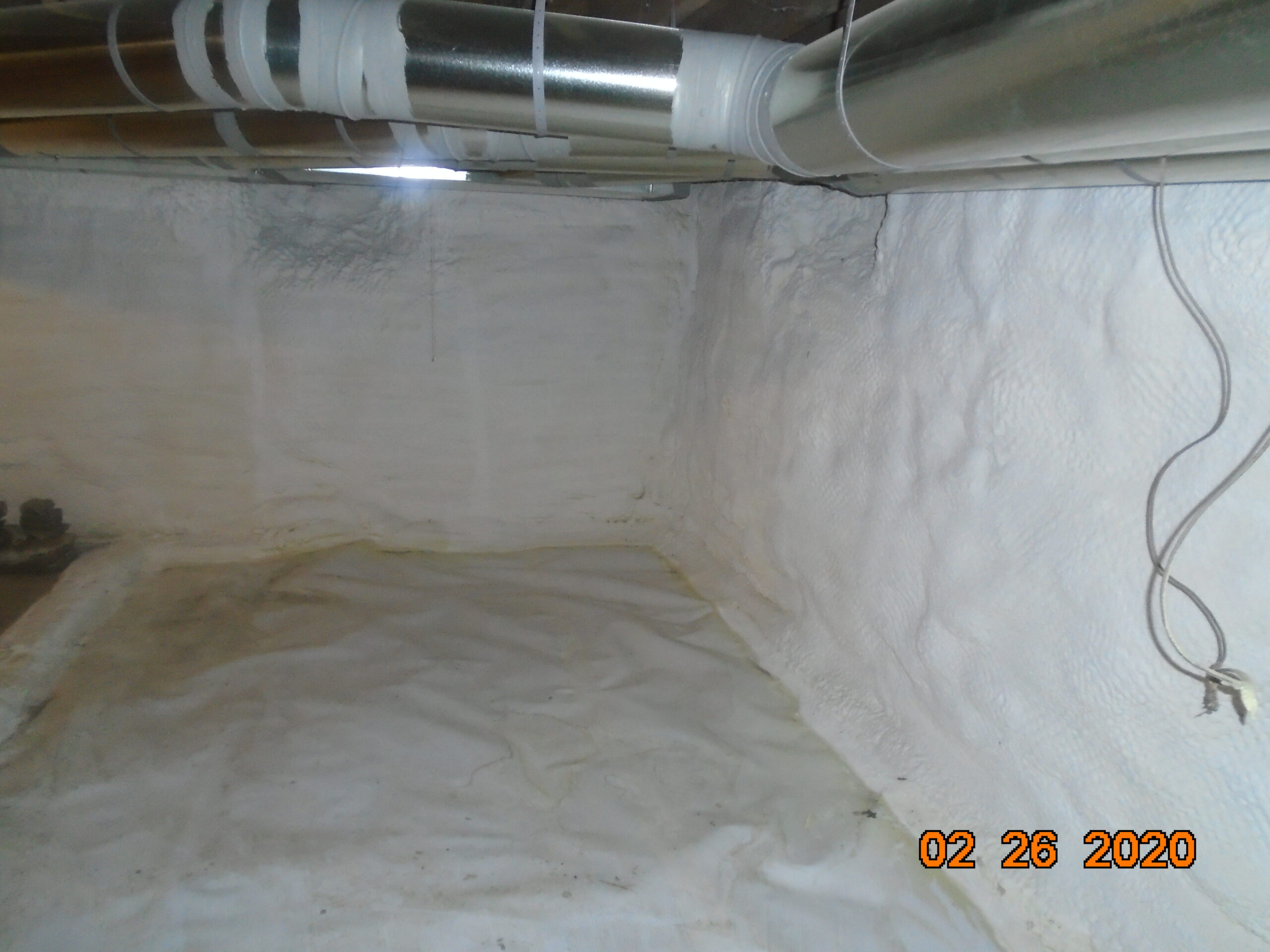 Here you can see that the basement was fully encapsulated with a vapor barrier and spray foam insulation.