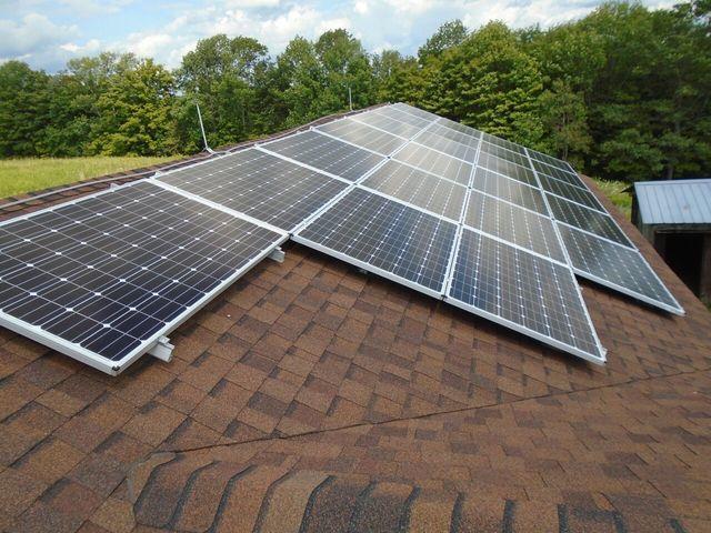 solar panels installed on a barn roof