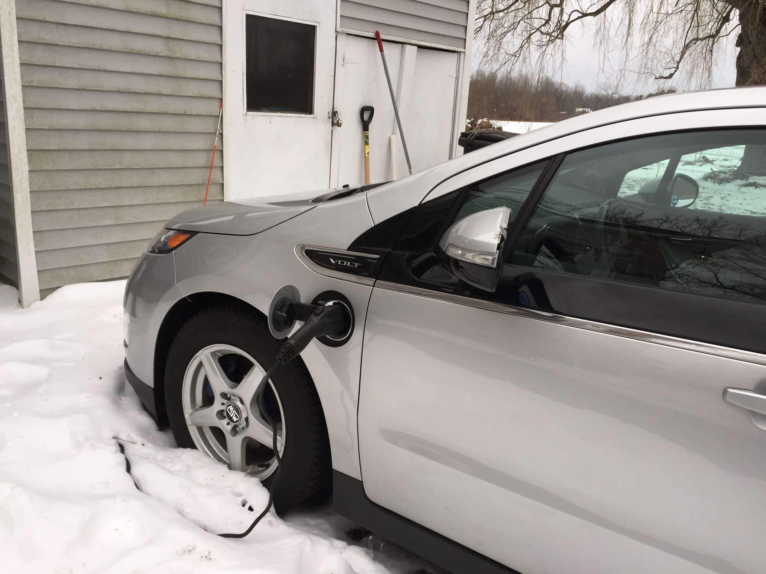 Chevy Volt being charged with power produced by solar.