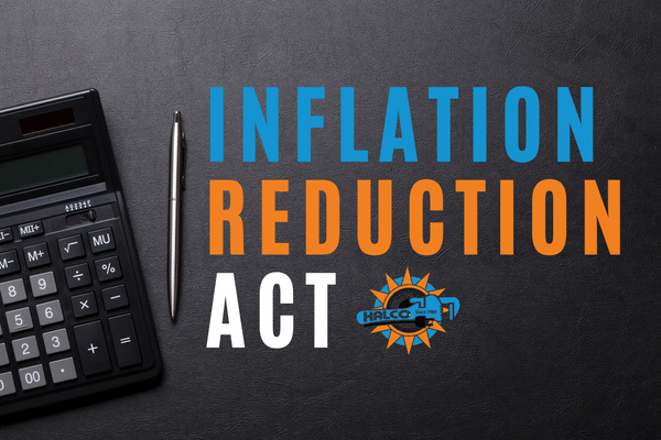 calculator on a desk with a pen