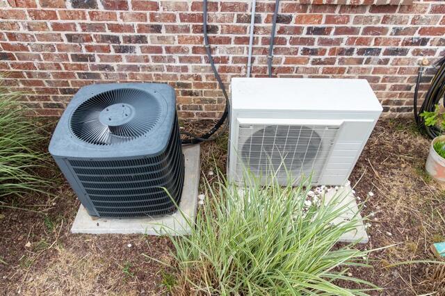 two different heat pump condenser units