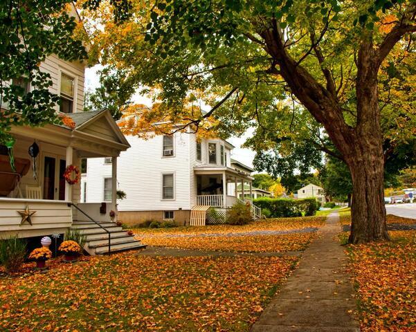 homes with fall leaves around
