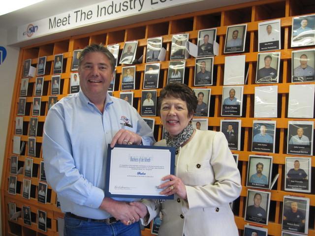 Finger Lakes Workforce Investment Board Executive Director Karen Springmeier presenting Halco President Hal Smith with the April 2013 Business of the Month Certificate.